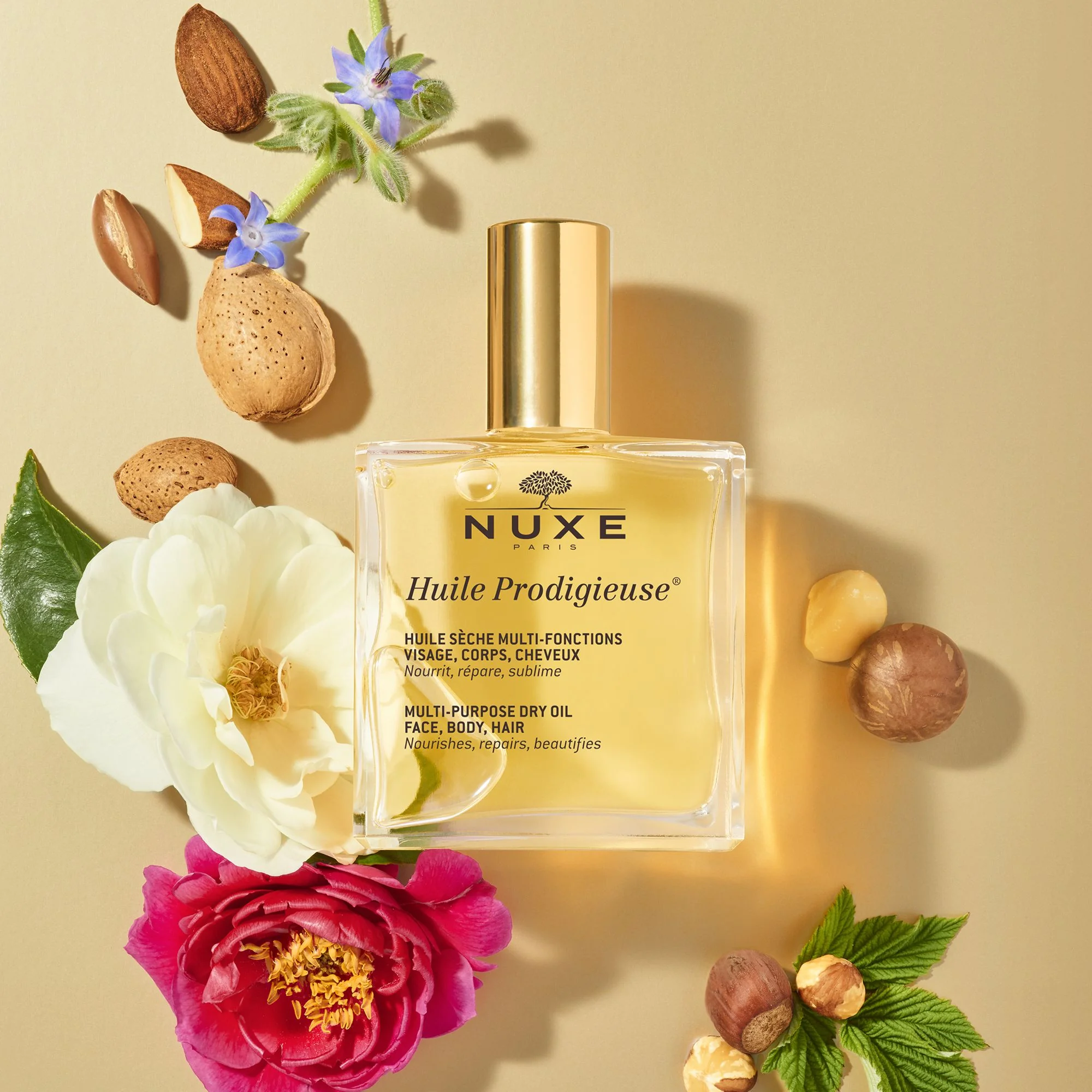 Nuxe Huile Prodigieuse suchy olejek pielęgnacyjny, 100 ml + suchy olejek pielęgnacyjny ze złotymi drobinkami, 8 ml