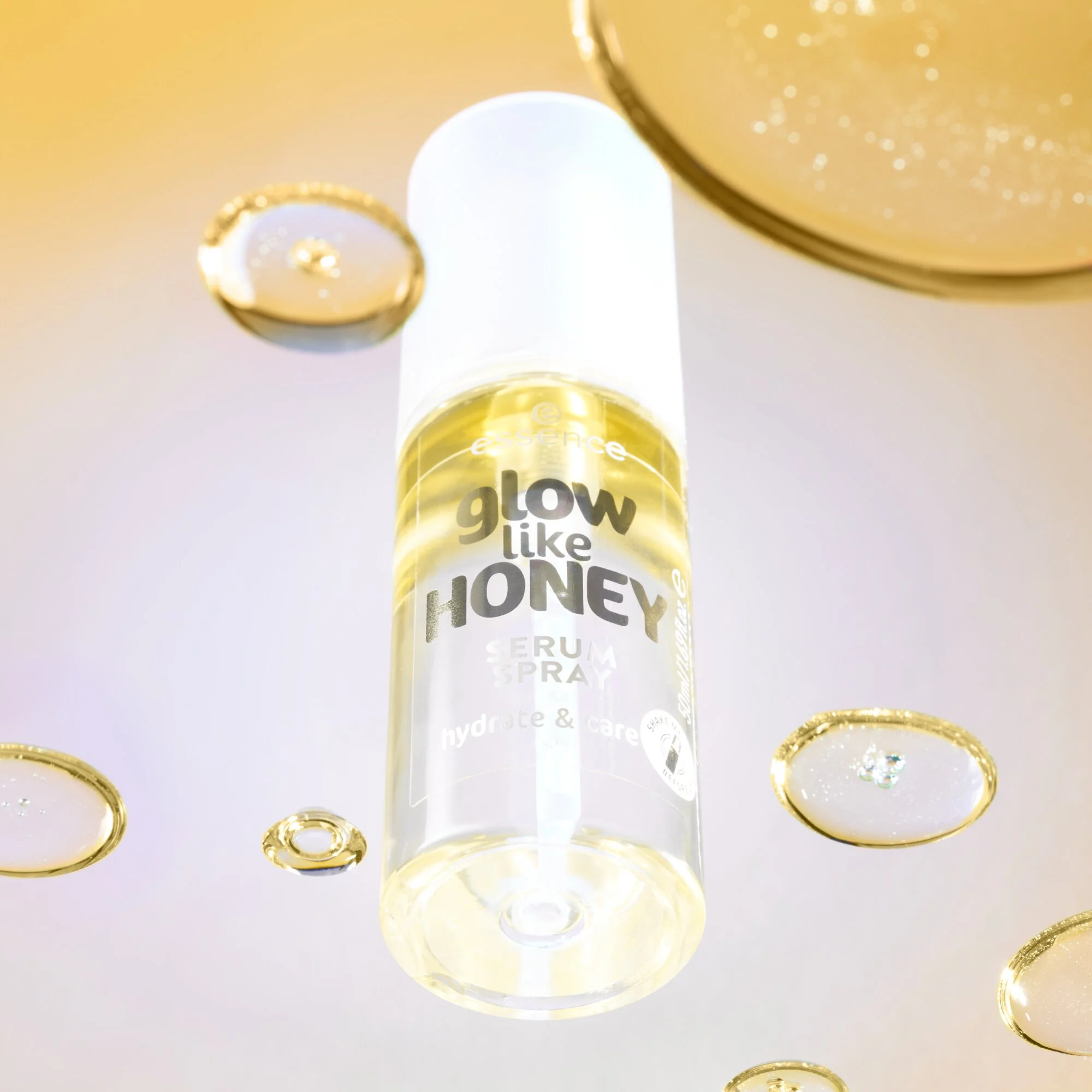 Essence Glow Like Honey dwufazowe serum w sprayu, 50 ml