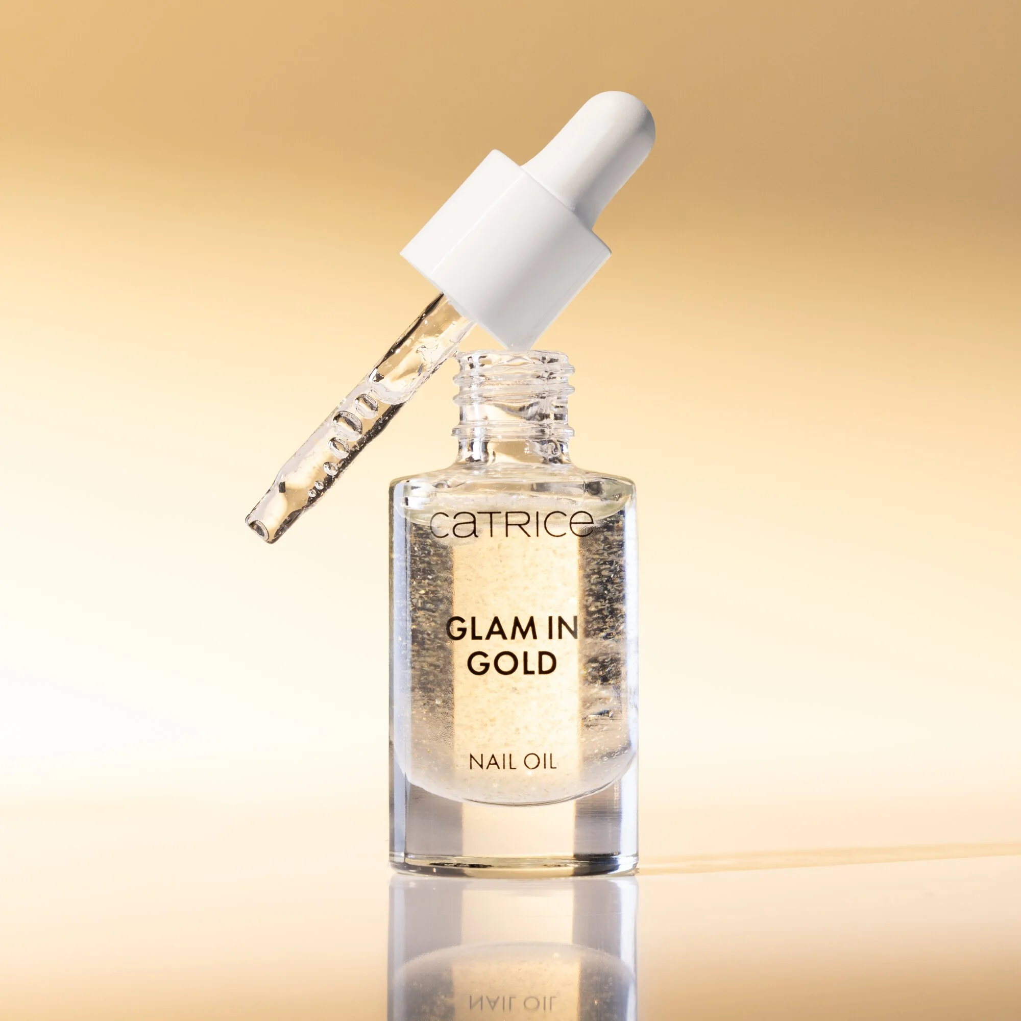 CATRICE Glam In Gold Nail Oil odżywczy olejek do paznokci i skórek, 8 ml