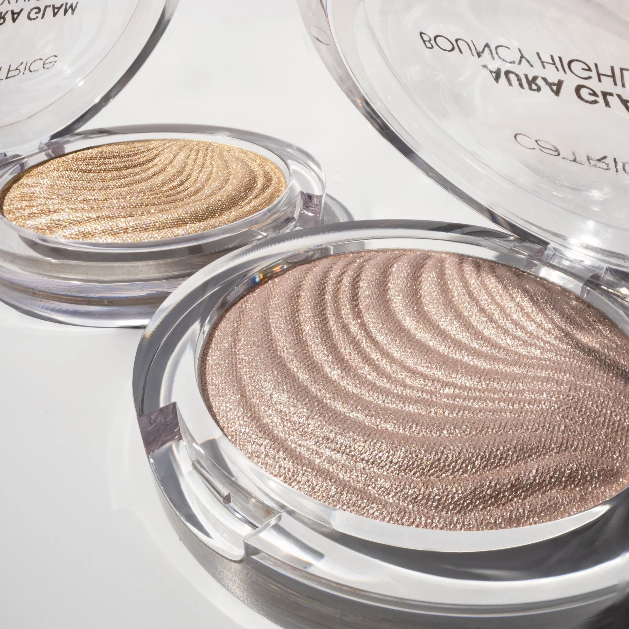CATRICE Aura Glam Bouncy Highlighter rozśwetlacz do twarzy 010 Moonlit Sand, 6,4 g